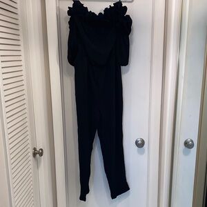 Elegant Black Off-Shoulder Jumpsuit worn once size L